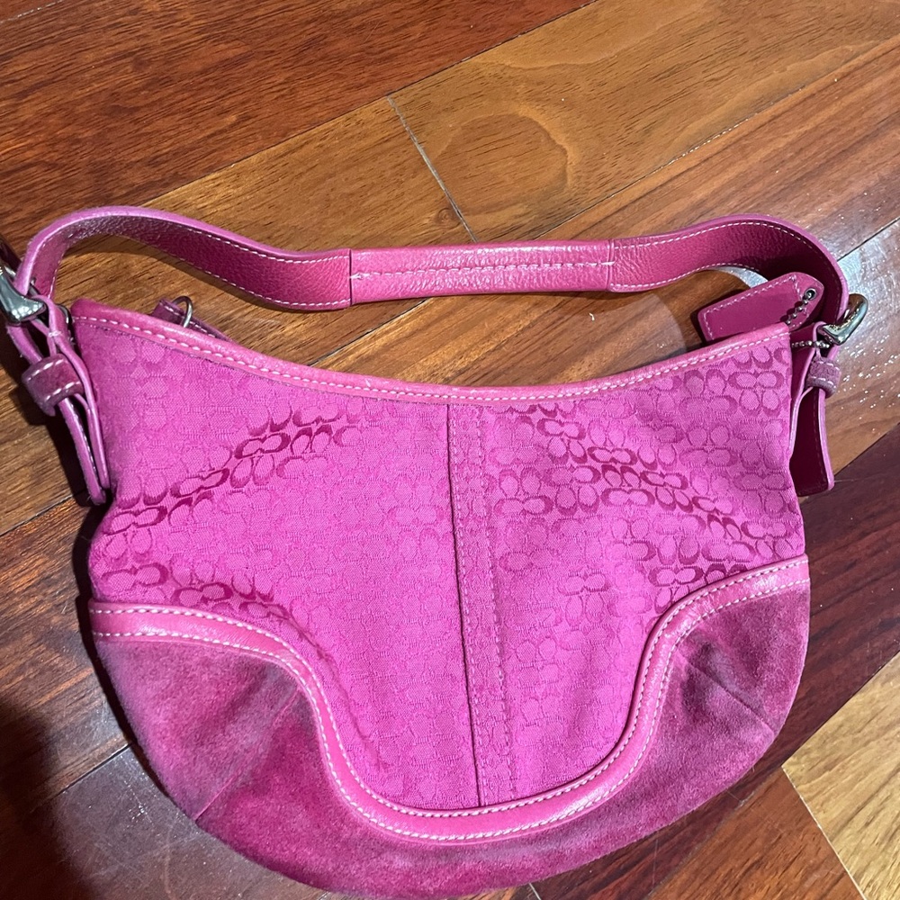 Coach jacquard shoulder bag with suede corners.